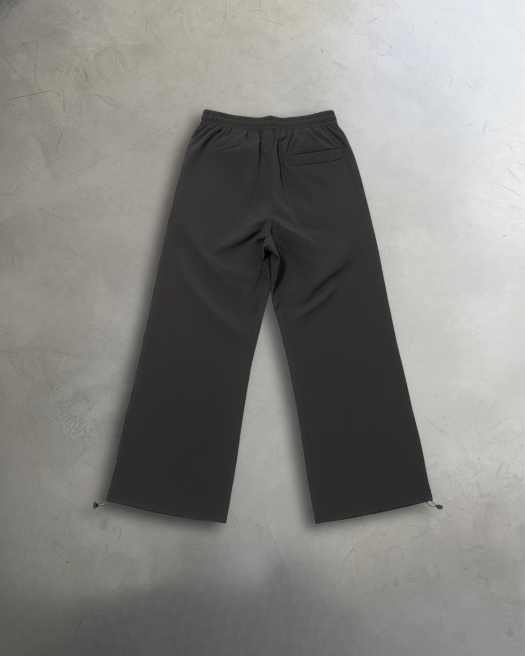 BACK OF BAGGY TRACK PANTS FLATLAY