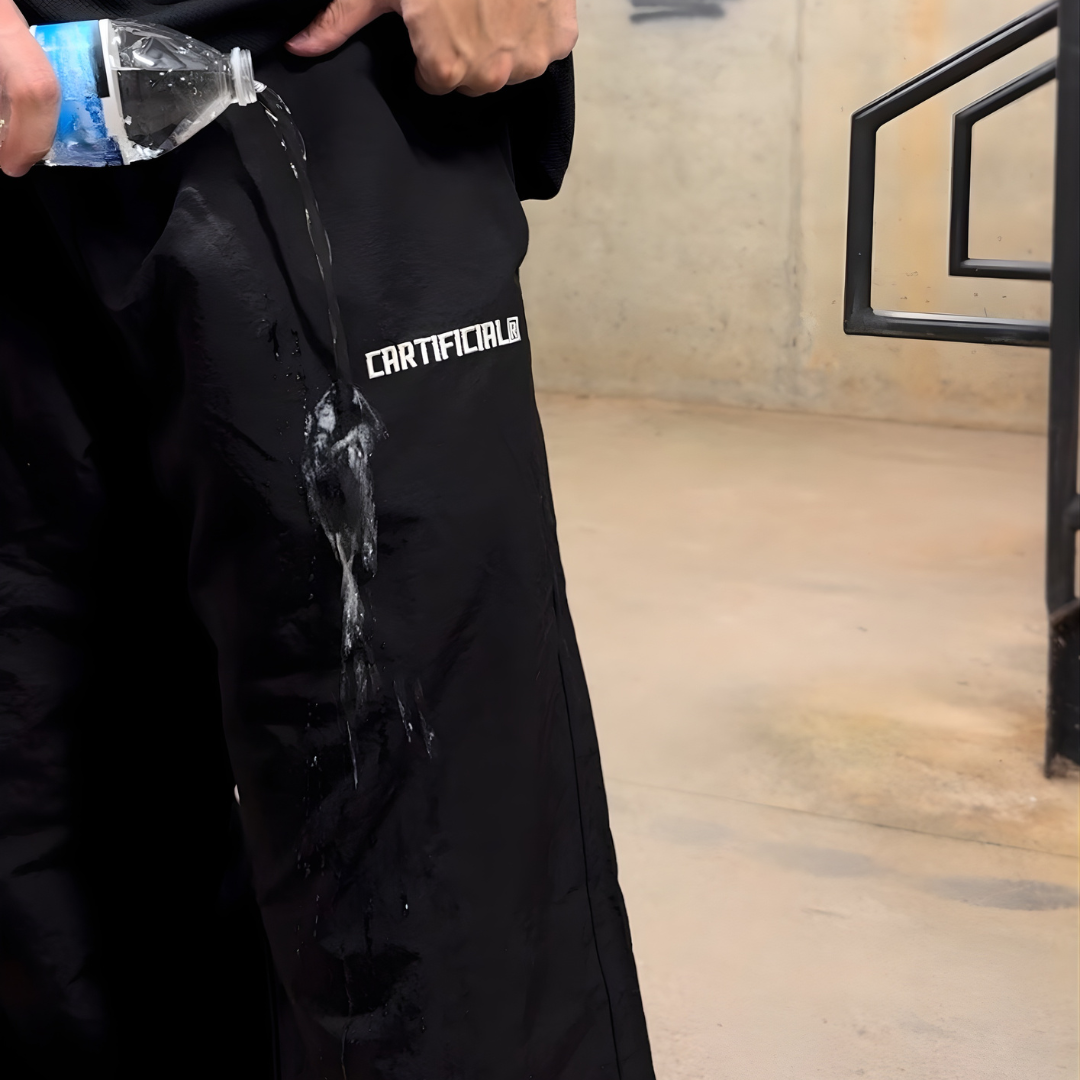 WATERPROOF BAGGY TRACK PANTS