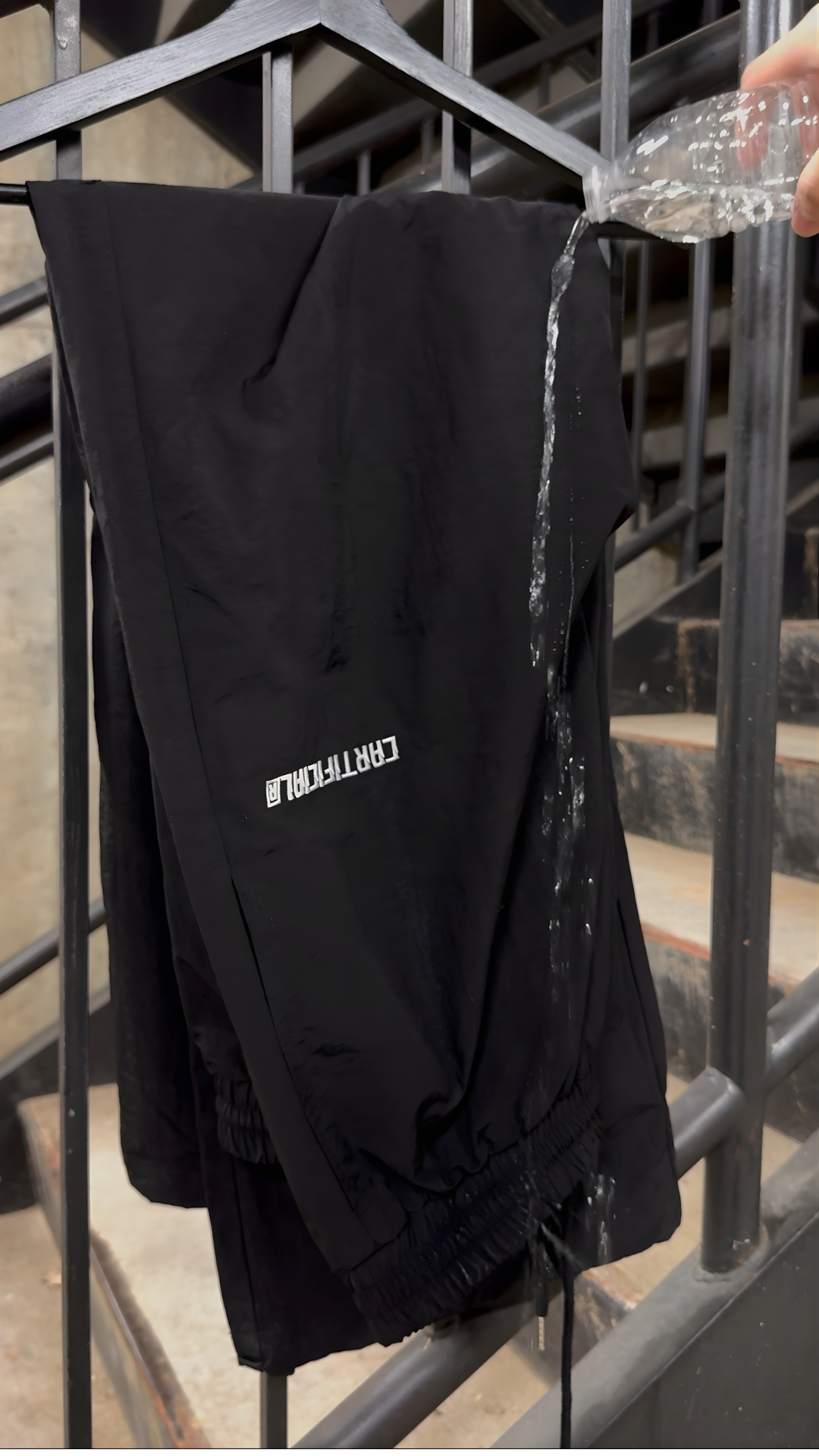 WATERPROOF BAGGY TRACK PANTS